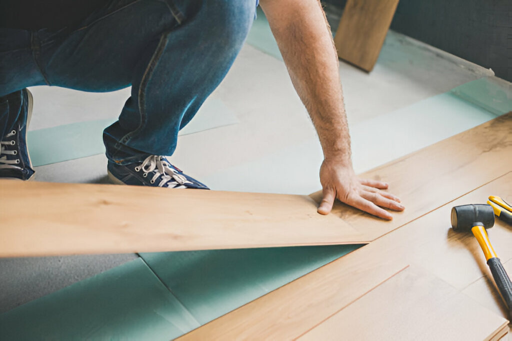 Professional flooring installation as part of home remodeling service by Franco’s Services in Utah, featuring hardwood floors in a stylish living space